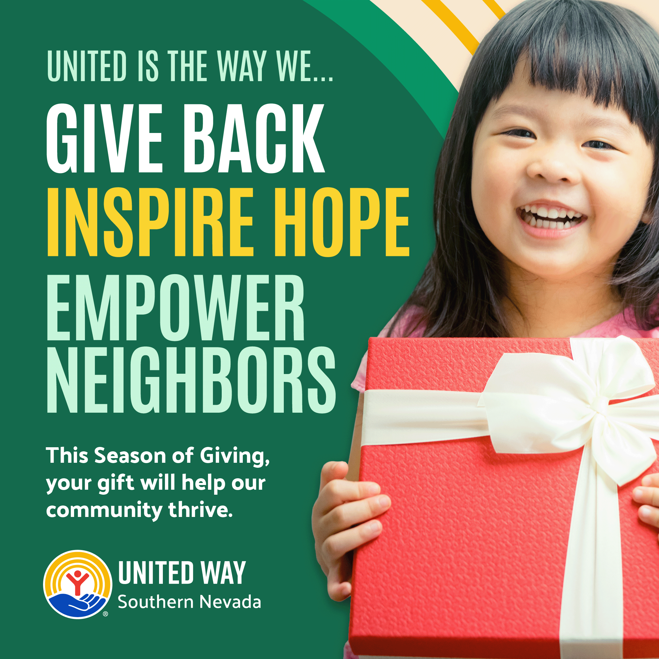 little girl holding red present